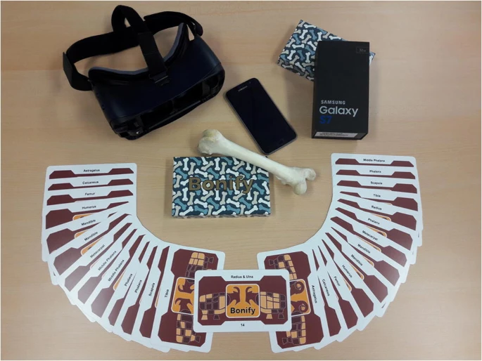 The Bonify AR equipment: headset, smartphone, cards, reference bone